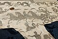 Poseidon in a chariot drawn by hippocampi, surrounded with dolphins, tritons, and Nereids on sea-monsters. Room 4 of the Baths of Neptune, Ostia Antica, Latium, Italy.